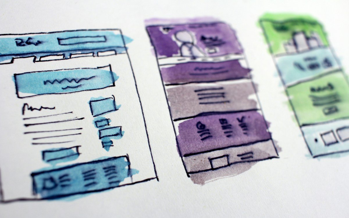 Colourful website wireframes sketched during design planning